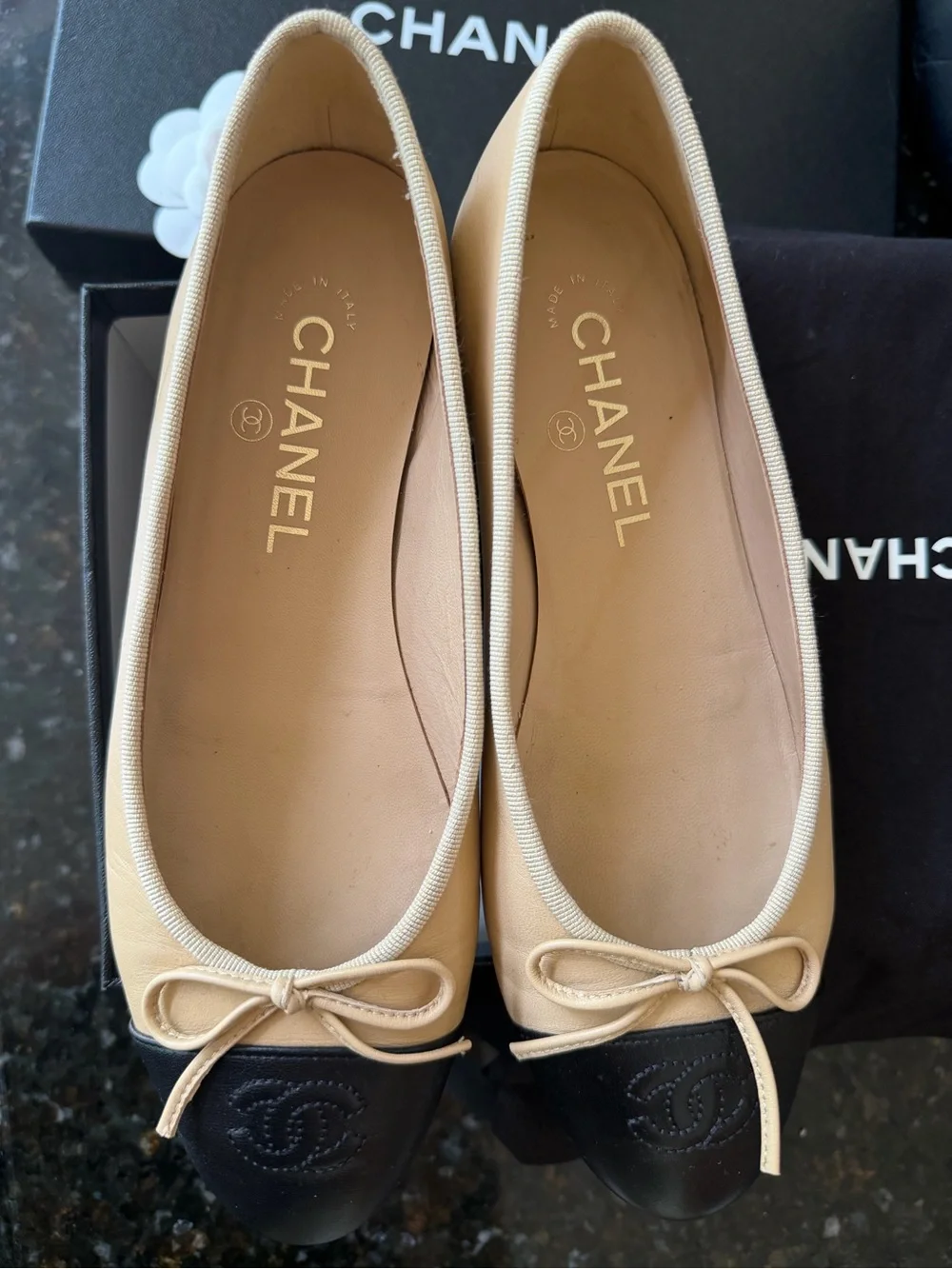 CHANEL Two-Tone Tan and Black Leather Cap-Toe Ballet Flats